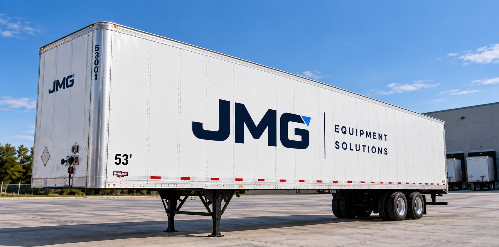JMG Solutions Group 53-foot dry van trailer in a Texas equipment yard